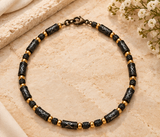 Black Metal Geometric Symbol Necklace with Gold-Tone Accents