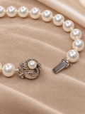 White Faux Pearl Necklace with Ornate Silver-Tone Clasp