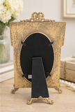 Antique Gold Bow Oval Picture Frame by Two's Company