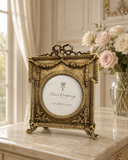 Antique Gold Bow Oval Picture Frame by Two's Company
